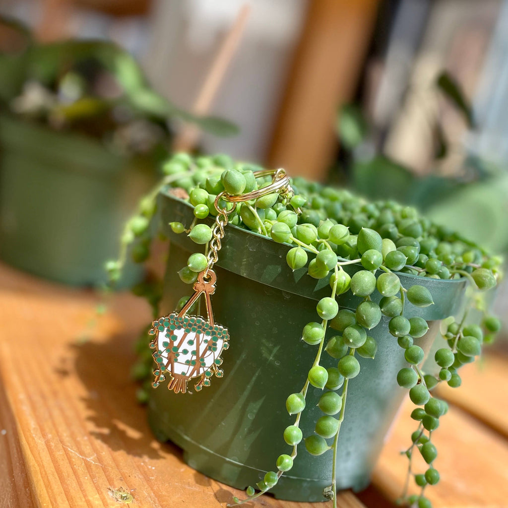 Gleaming String of Pearls Enamel Keychain