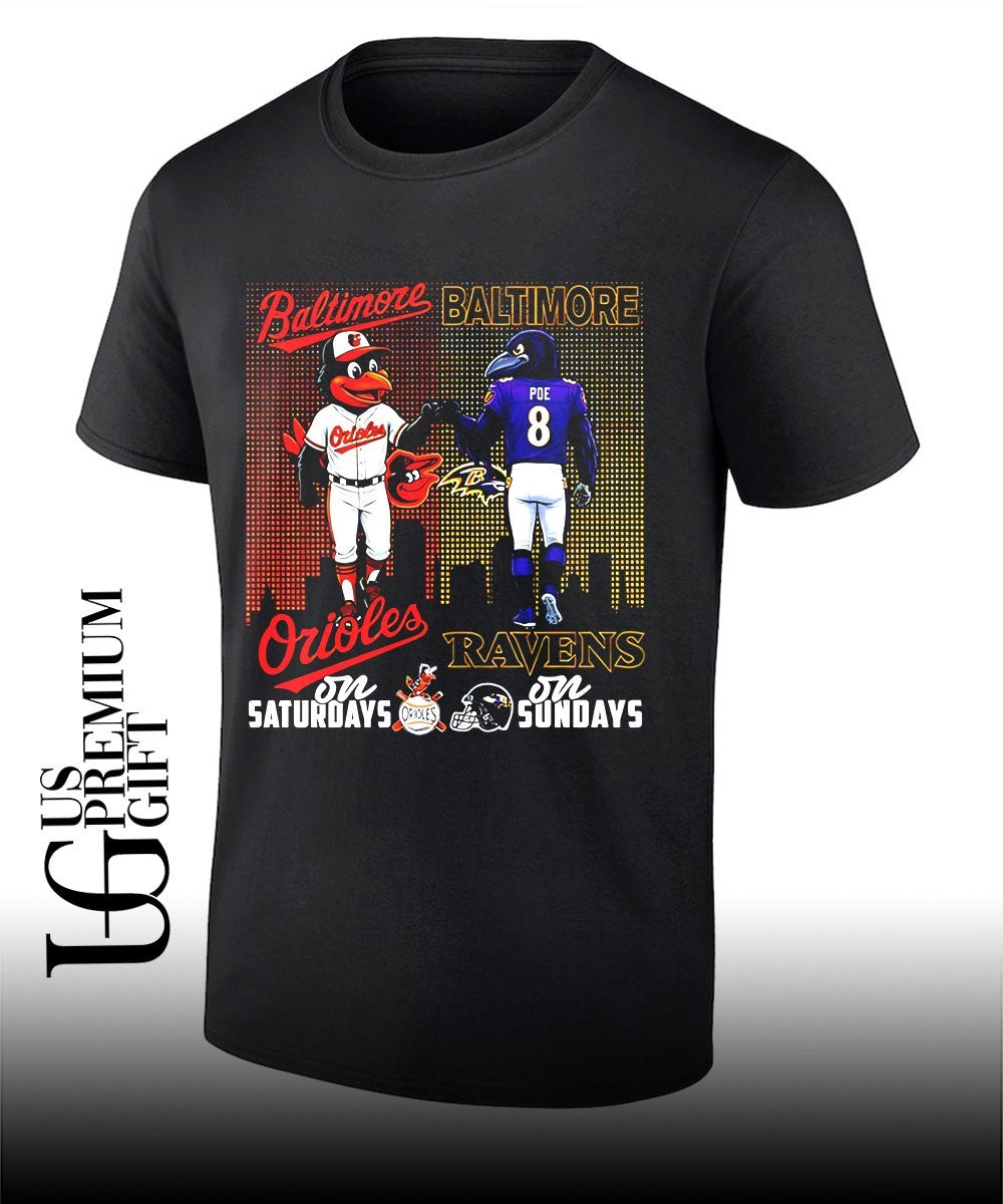 Baltimore Orioles on Saturdays fist bump Baltimore Ravens on Sundays city skyline 2026 mascot shirt