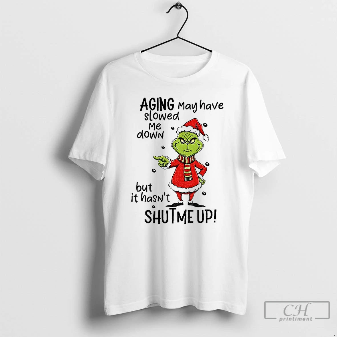 Classic Grinch Santa Hat Aging May Have Slowed Me Down But It Hasnt Shut Me T-Shirts, Hoodie, Sweatshirt | PopFlextees.com