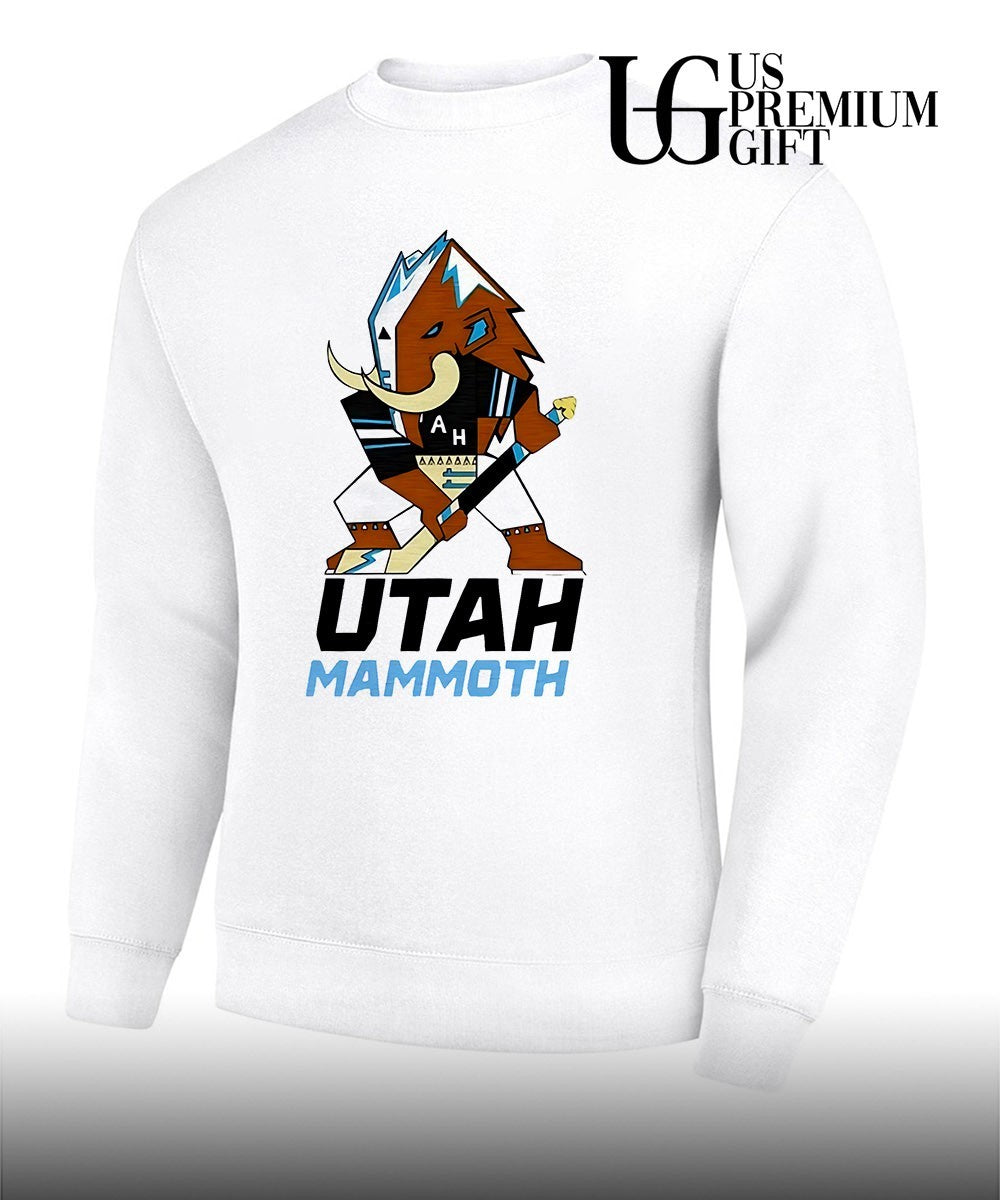 Lawson Crouse with Utah Mammoth mascot shirt