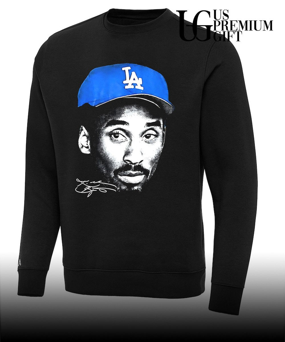 Myles Garrett wearing Kobe Bryant Dodgers hat signature shirt