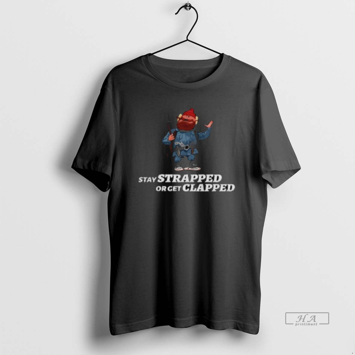 Official Yukon Cornelius Stay Strapped Or Get Clapped T-Shirts, Hoodie, Sweatshirt | PopFlextees.com