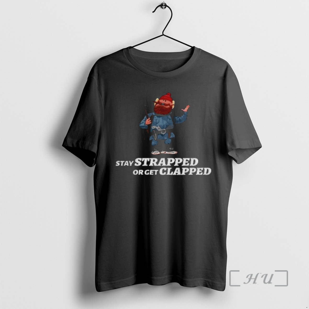 Officials Yukon Cornelius Stay Strapped Or Get Clapped T-Shirts, Hoodie, Sweatshirt | PopFlextees.com
