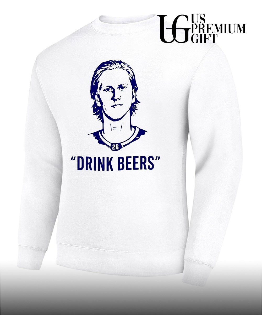 Sam Carrick wearing Rasmus Dahlin Drink Beer shirt
