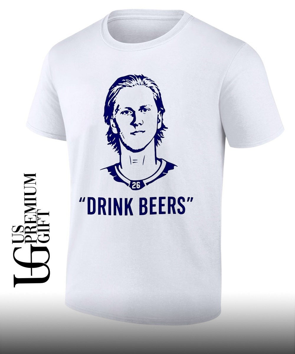 Sam Carrick wearing Rasmus Dahlin Drink Beer shirt