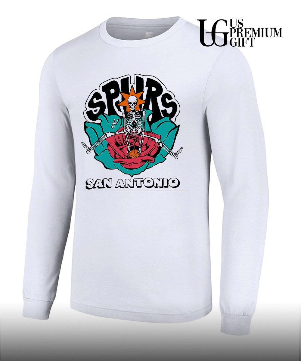 Skeleton sitting in rose San Antonio Spurs Basketball shirt