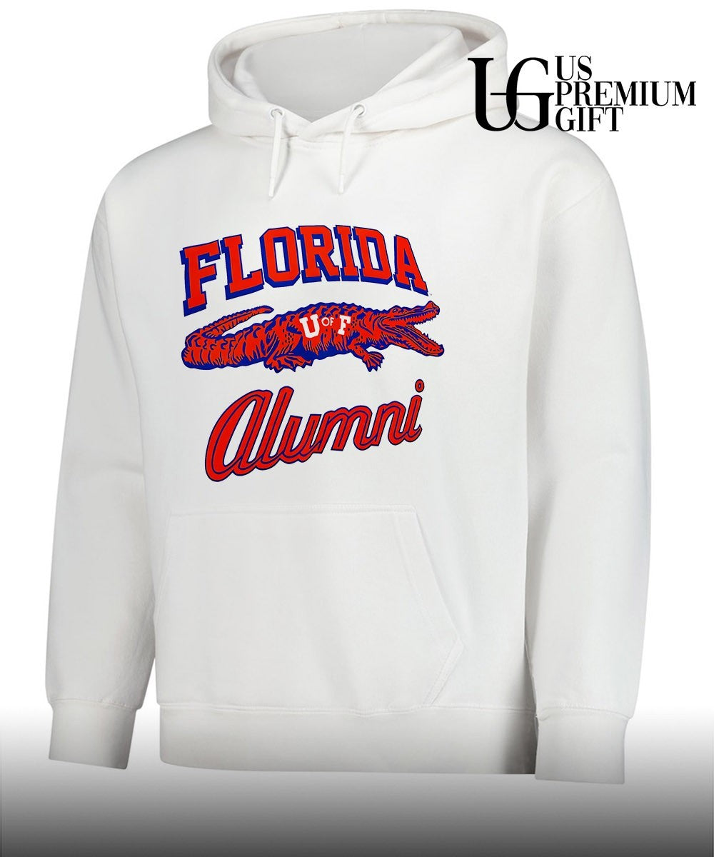 Tim Tebow wearing University of Florida Alumni shirt