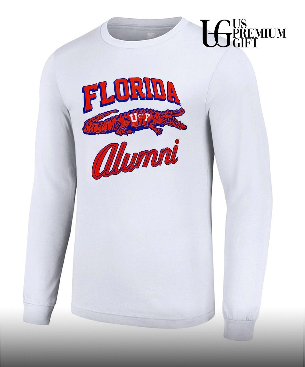 Tim Tebow wearing University of Florida Alumni shirt