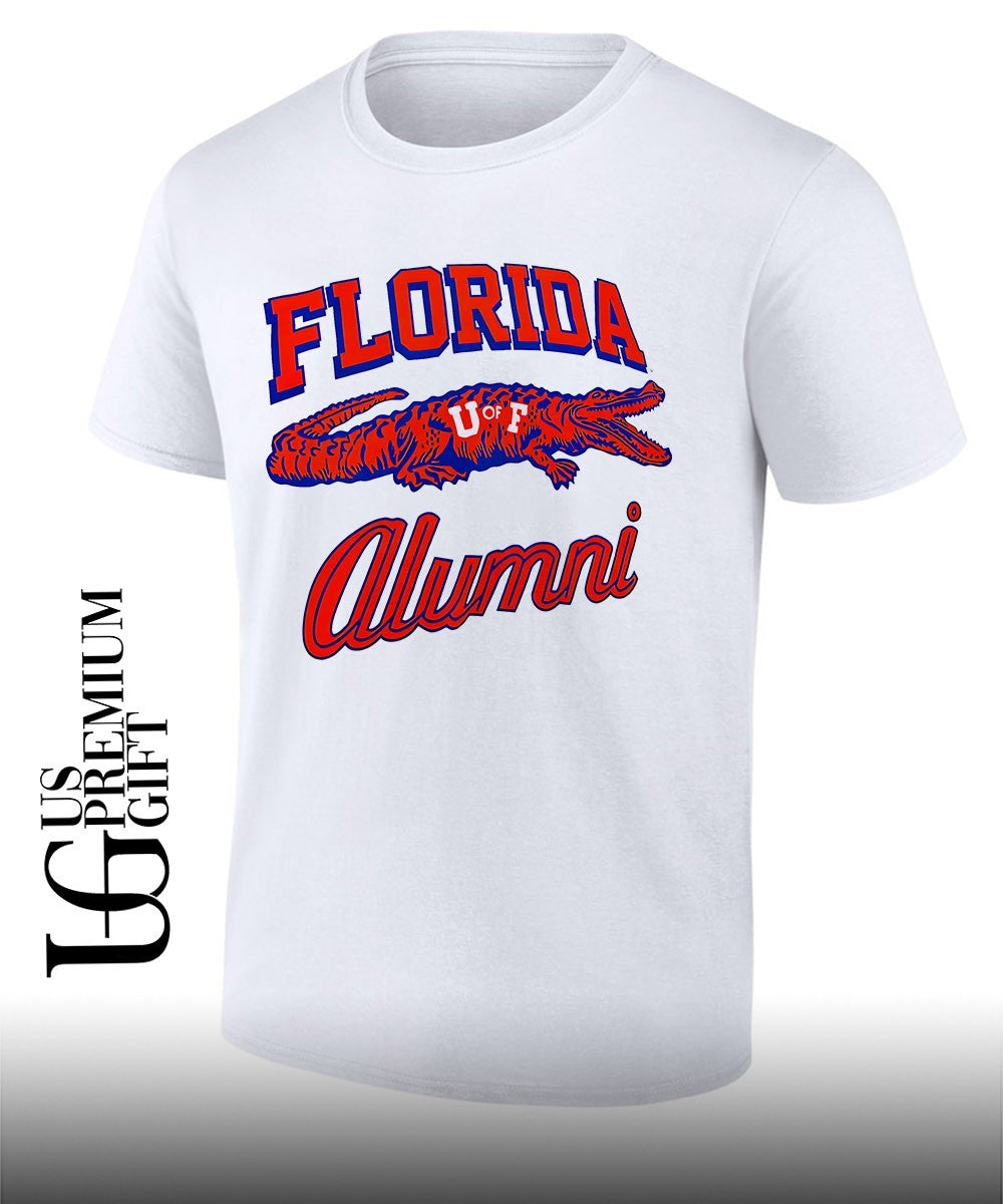 Tim Tebow wearing University of Florida Alumni shirt
