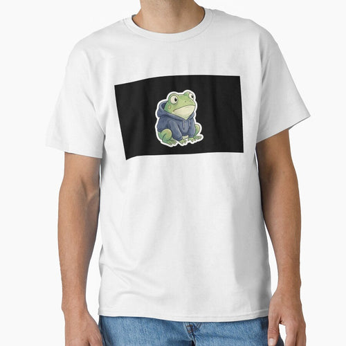 A cute, round frog looking confused, wearing a tiny hoodie. White border for sticker. by Yogeshrock