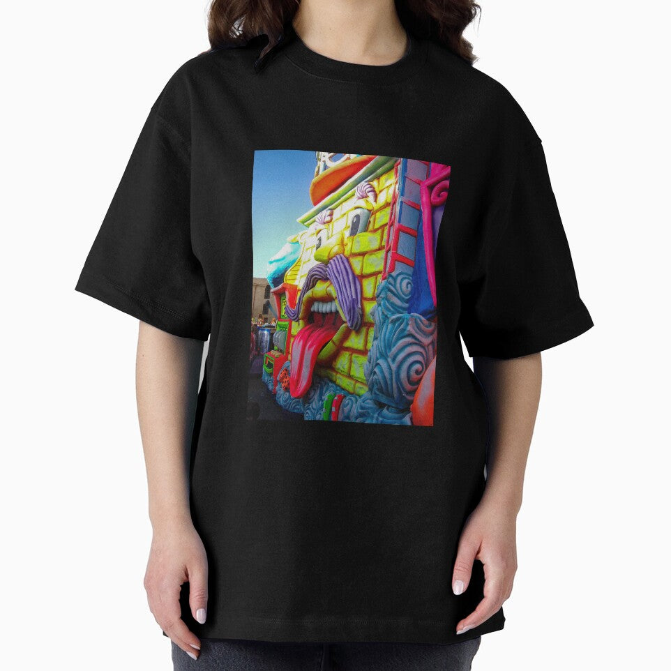 Colorful Carnival Parade Float With Giant Cartoon Face Tongue Out And Purple Mustache by Nmallia